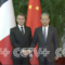 China’s top legislator meets French president